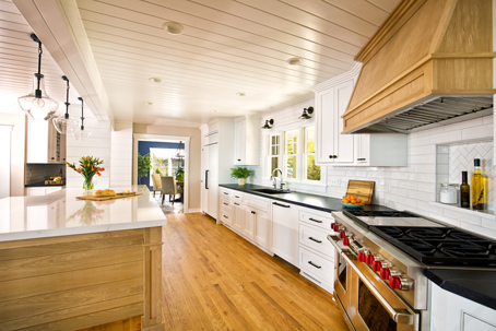 modern white kitchen with wood accents