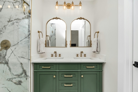 bathroom with green cabinets